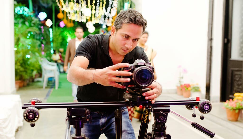 Best wedding photographer Chandrasekhar Chakraborty is filming Cinematic Wedding video with Nikon DSLR & slider