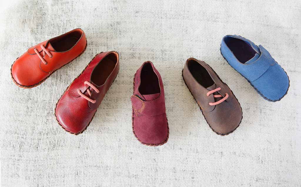 five different types of children's leather shoes, product photography for e commerce
