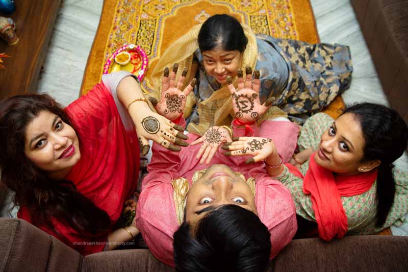 Mehndi photography of groom and family