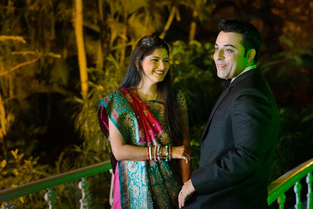 Candid photo of indian wedding couple, photo using natural light of the bridge at night