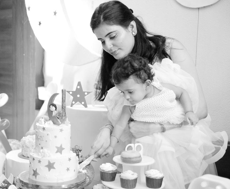 Baby Dhriti's 1st Birthday Cake Cutting black & white image with mom