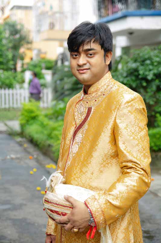 Outdoor photo shoot of Bengali muslim groom with Sherwani