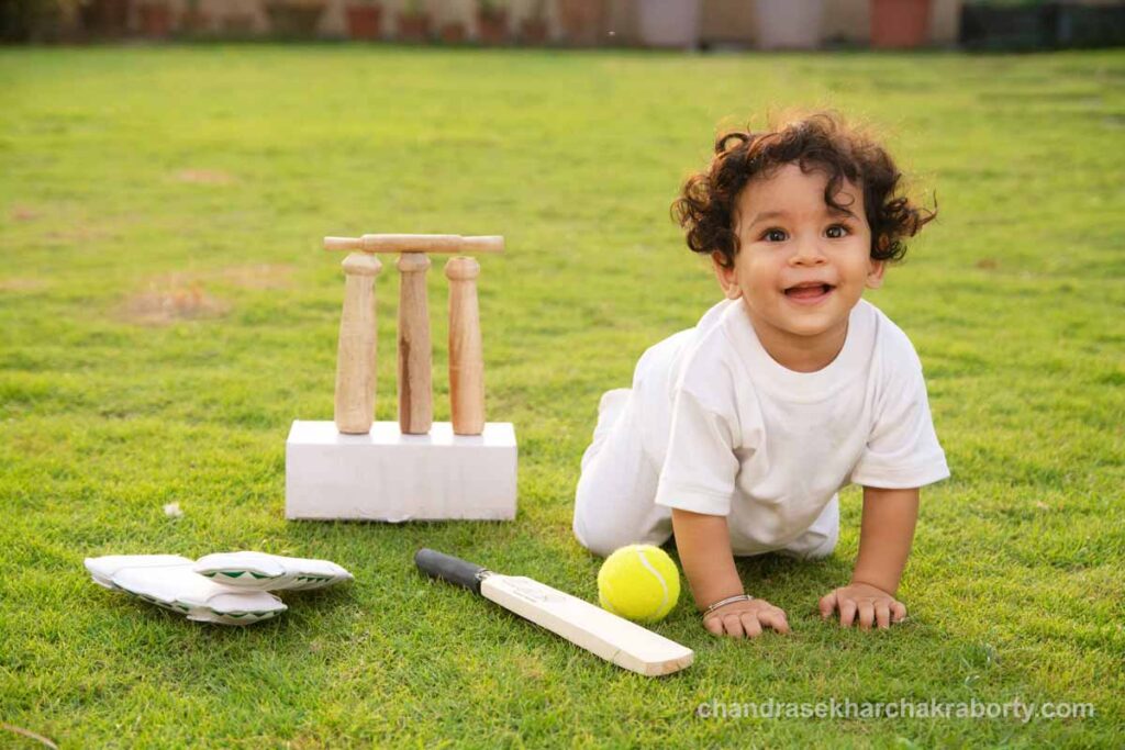 Baby photoshoot with Cricket themes