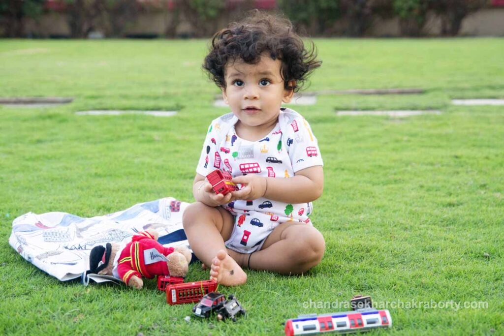 1 year old baby pictures. baby playing with toys